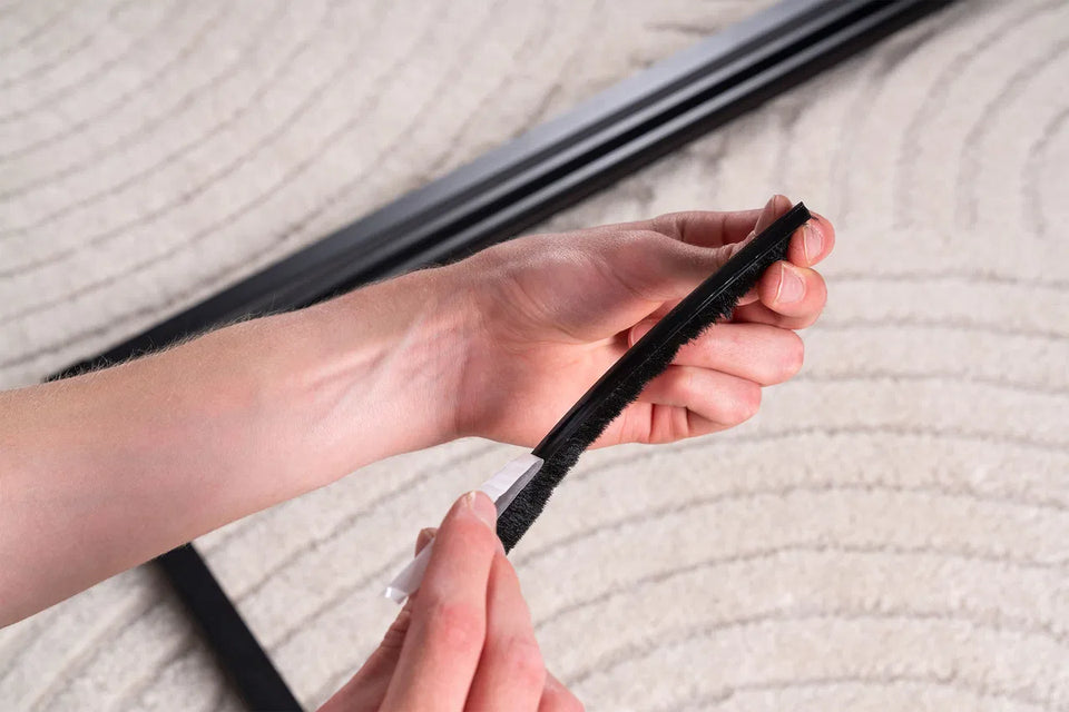 Step 6: Peel back the brush strip backing
